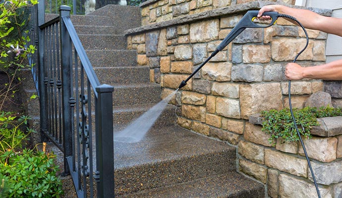 pressure power washing the front entrance stair steps